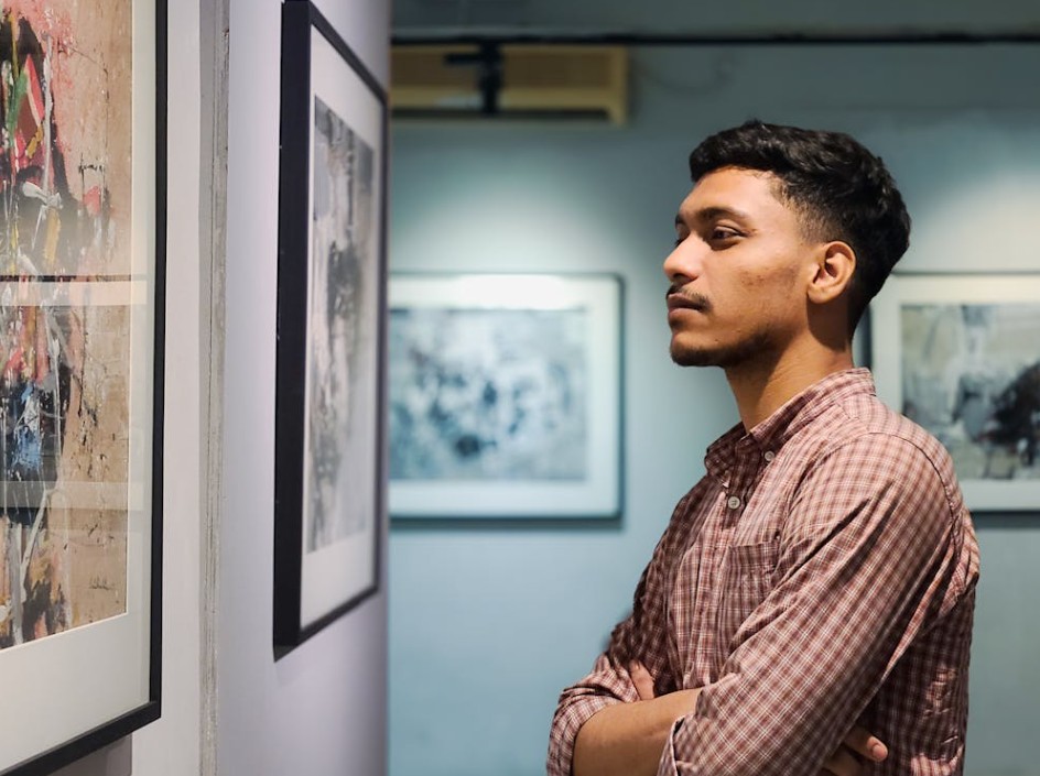 Image of a man at an art gallery.