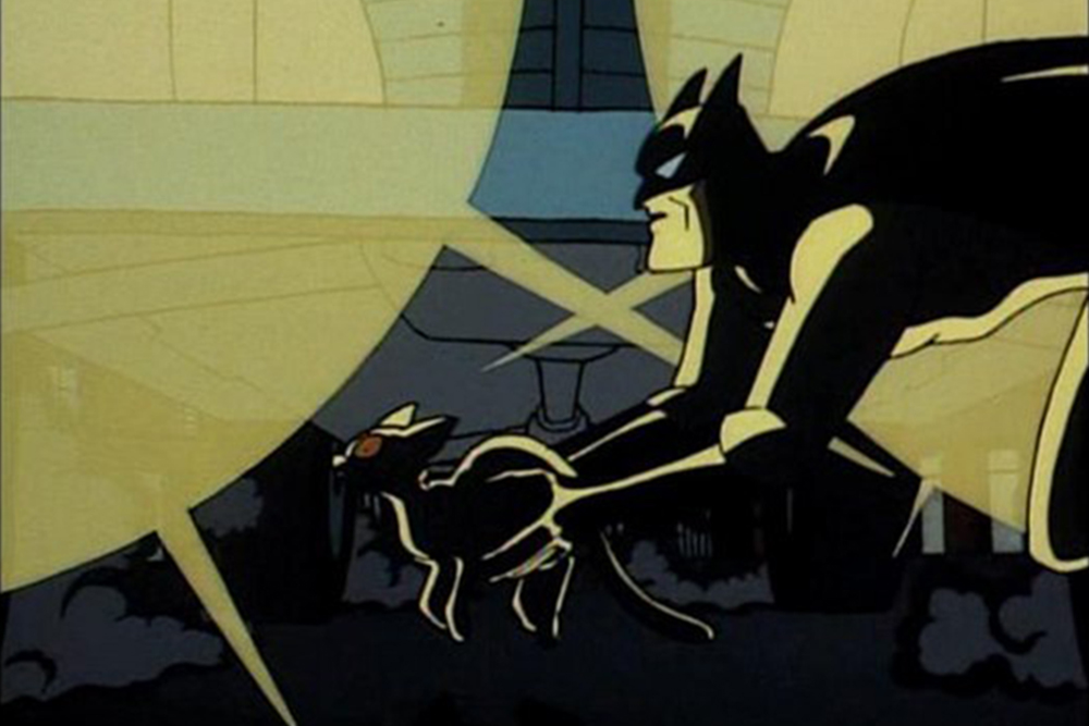 Image of Batman saving Catwoman's cat in the animated series.