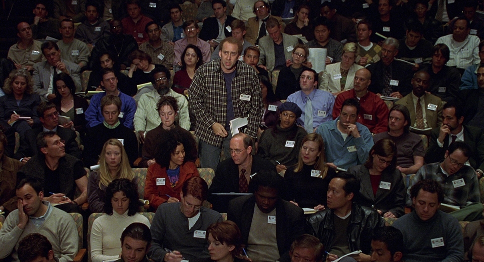 How it feels to pitch your movie | still from the movie adaptation when Nicholas Cage's character pitches his movie about nothing to Robert McKee.