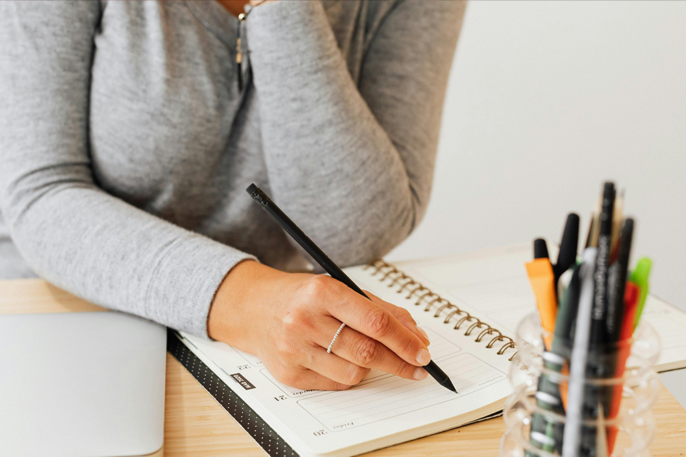 Image depicting the lightness and ease of how to become a better writer, a multifaceted question that starts with planning and goes through organizing your work and eventually making it easier to give yourself the permission to write