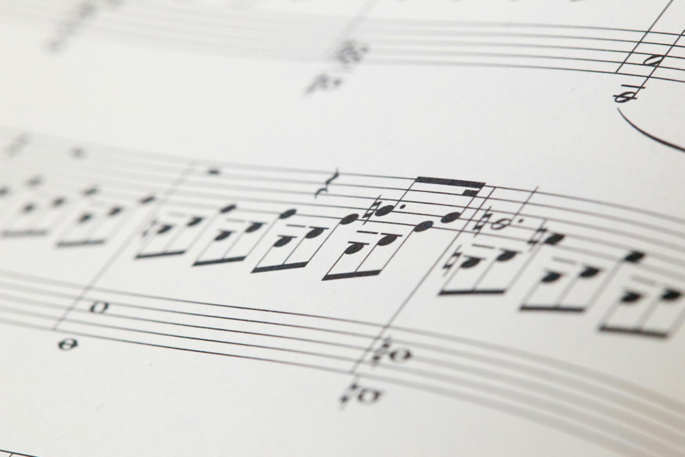 Though you may not exactly be notating music, thinking of the voice of your character in a musical sense while you read their external and internal dialogue aloud while writing is one of the ways to describe a voice that will serve your audience well.