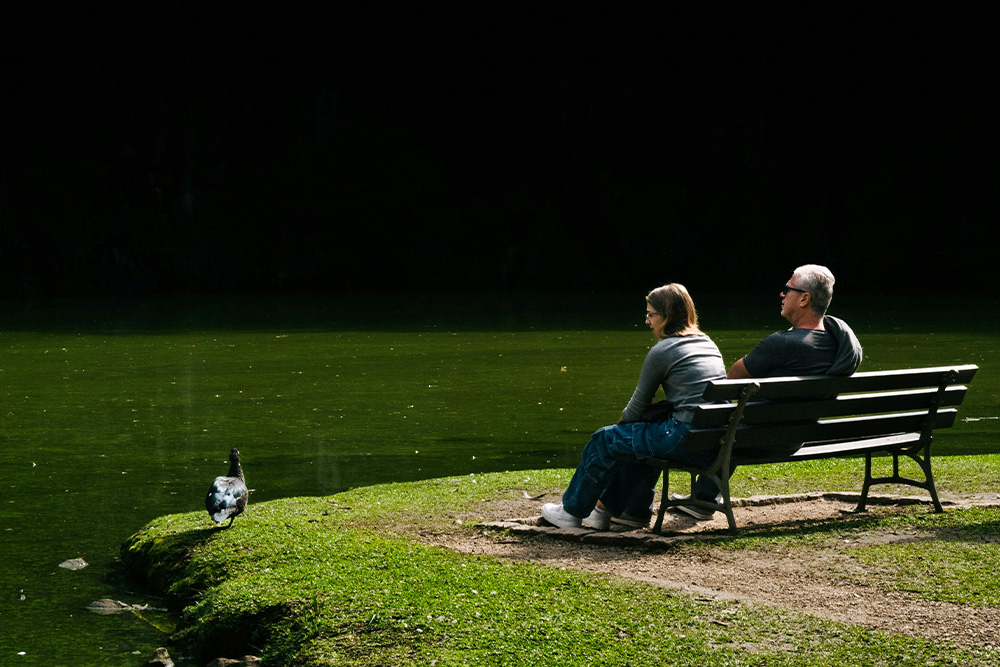What is one of the places where you need to be loud, versus one of the places you would want to be quiet? A serene bench by a pond pictured her to give a sense of quietude