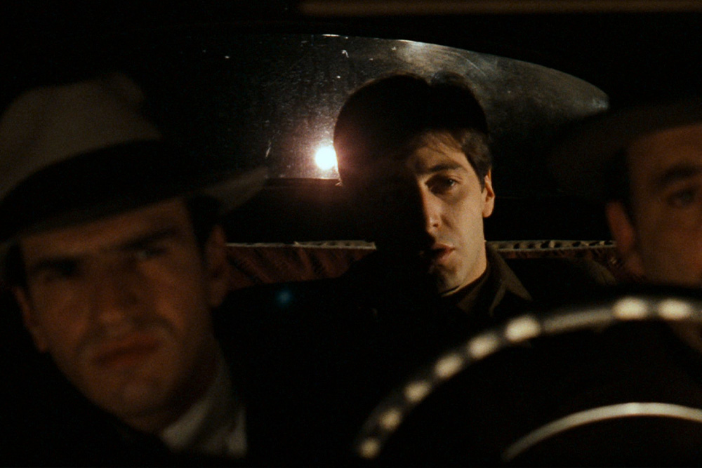 Still of Michael reconnecting with his family in order to protect his father in the movement of 5-Act Structure