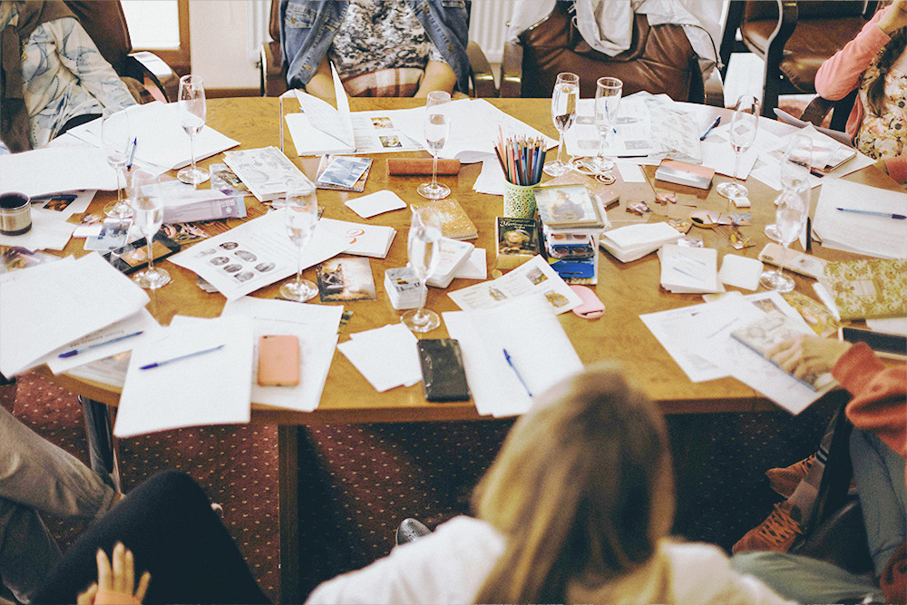 writers come together in communion with drinks and drafts to suggest a freedom and community by learning how to self-publish a book
