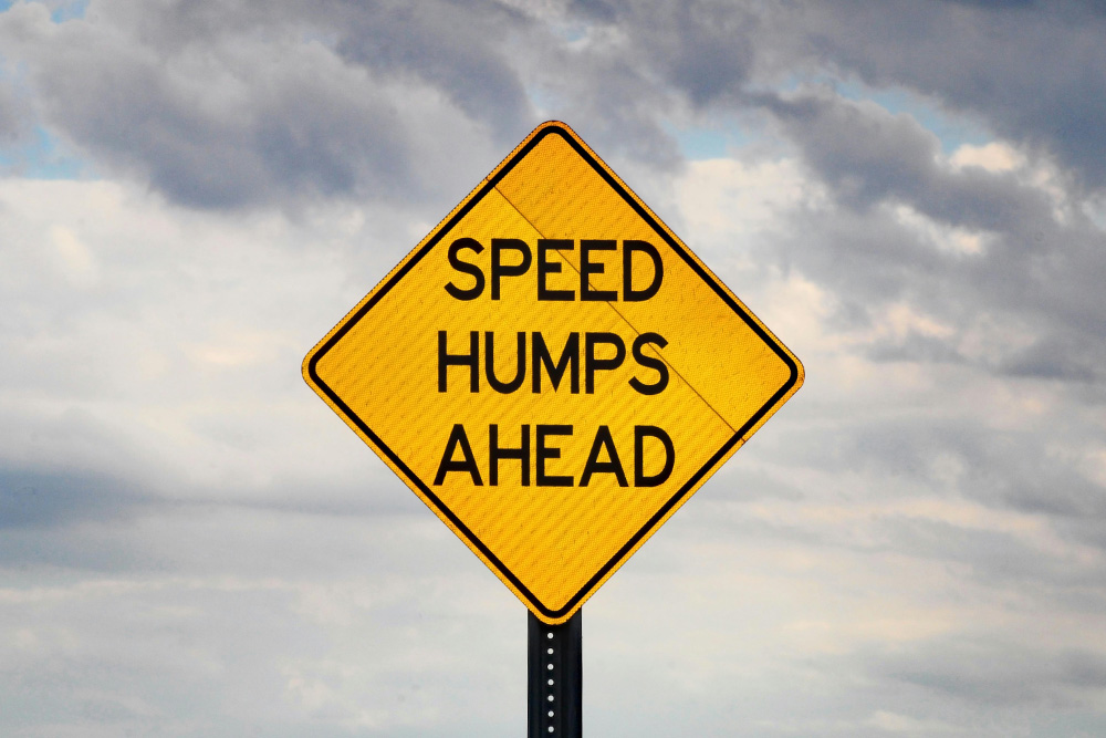 Every writer wants to know how to write faster but it's only natural to understand that there are going to be roadblocks in the way as you work. A sign is visualized here as a stark reminder of this warning in the writing road so that the writer may take necessary precautions to prepare.