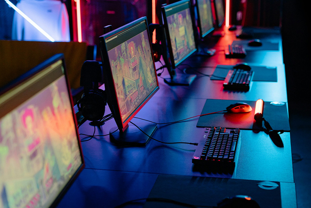 A gaming cafe with lots of colors and lights is a great way to visualize what allowing yourself on the internet while you write is like and how it can distract when you are overcoming procrastination