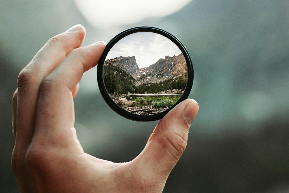 Notice how such a small amount of the frame is dominated by this little lens of nature, but yet it command so much attention? Being specific in sensory details also achieves this effect.