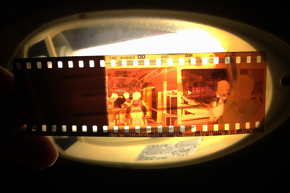 Picture of a small strip of film developing used to visualize stylishly how character development works in a short film