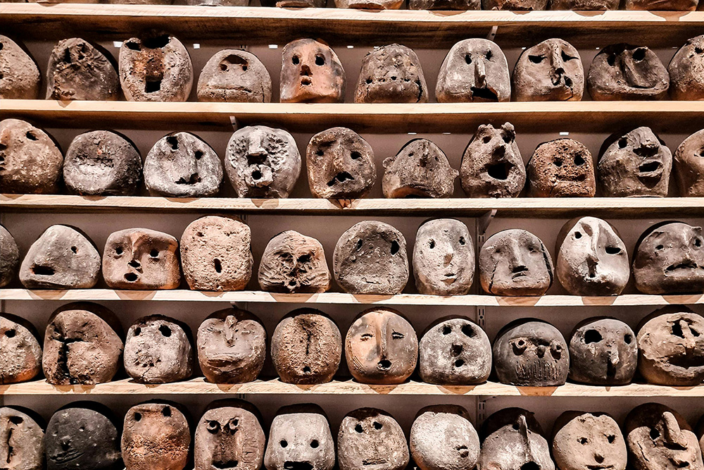 Clay faces crafted throughout time suggest universal themes in story that long precedes our civilized way of life