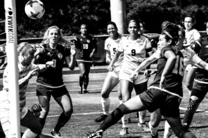 An image of footballers all watching in amazement as a soccer ball flies into the goal, to invoke the theme: "equipped with these tools, any author can achieve their writing goals and stun those around them."