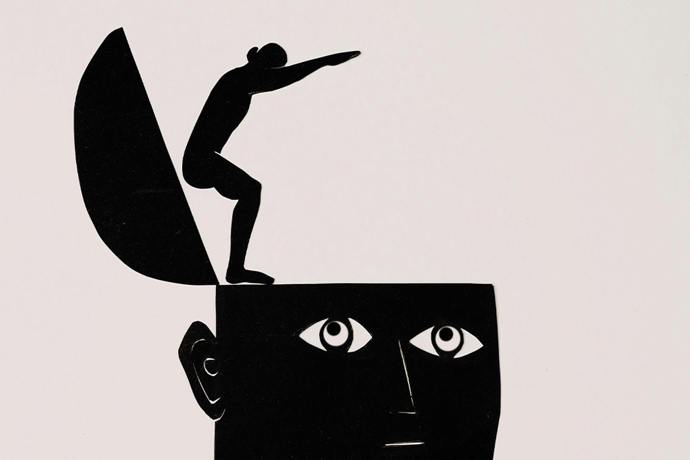 Ideas that can get you going represented here by someone watching themselves dive into their own brain for memoir ideas