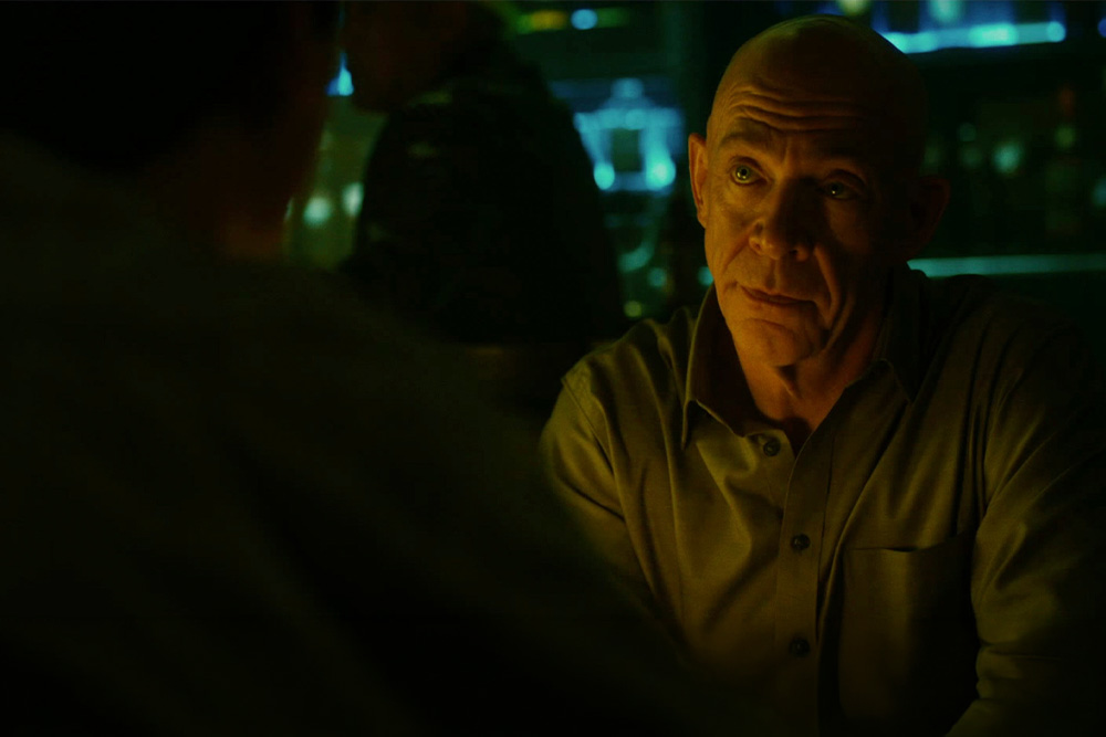 Fletcher sits across from Neiman in a bar and convinces him that his methods to create greatness are completely reasonable