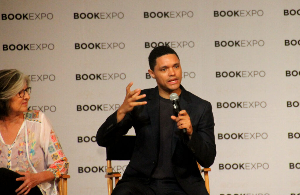 Author Trevor Noah in a Q&A is presented as a means to describe visually the role of an epigraph and how to start a memoir with a statement that offers a reader a throughline