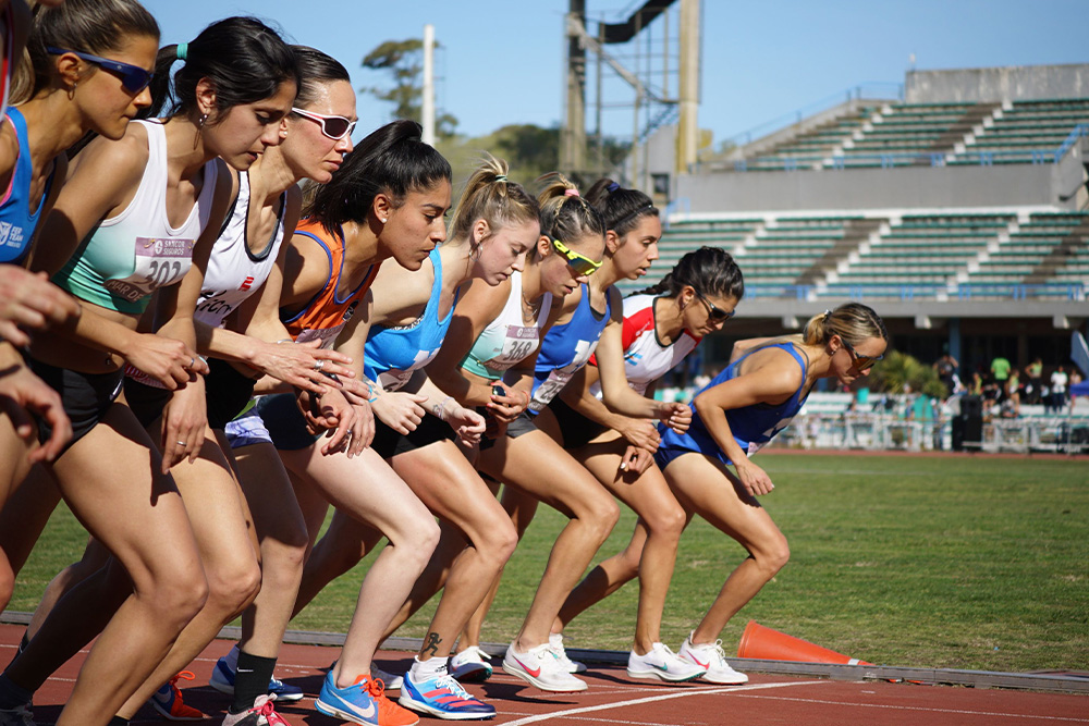 Runners line up at the start of a track as examples of memoirs to write for oneself