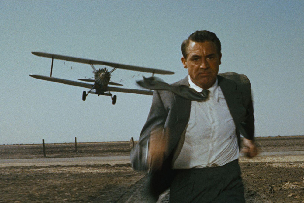 A man runs toward camera in the Alfred Hitchcock film North by Northwest to suggest how the Fichtean Curve is attention grabbing