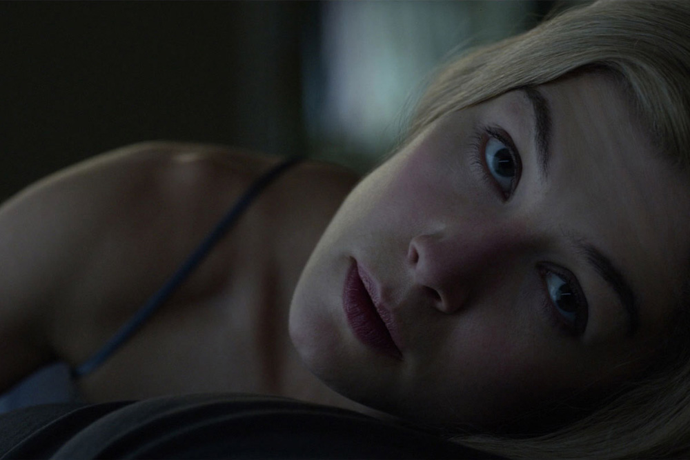 Still from the beginning of the film Gone Girl to suggest visually that something is awry, tilted composition, foreboding scene, blue