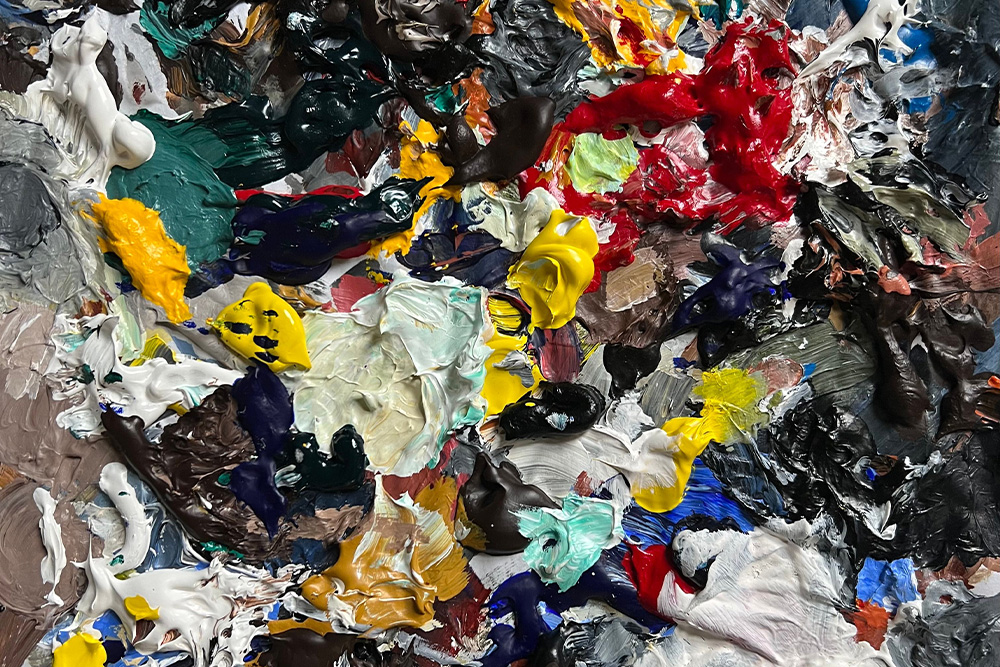 A messy, unfocused mix of paints suggests that revising vs. editing must be clearly defined to work reasonably in the scope of a piece of writing