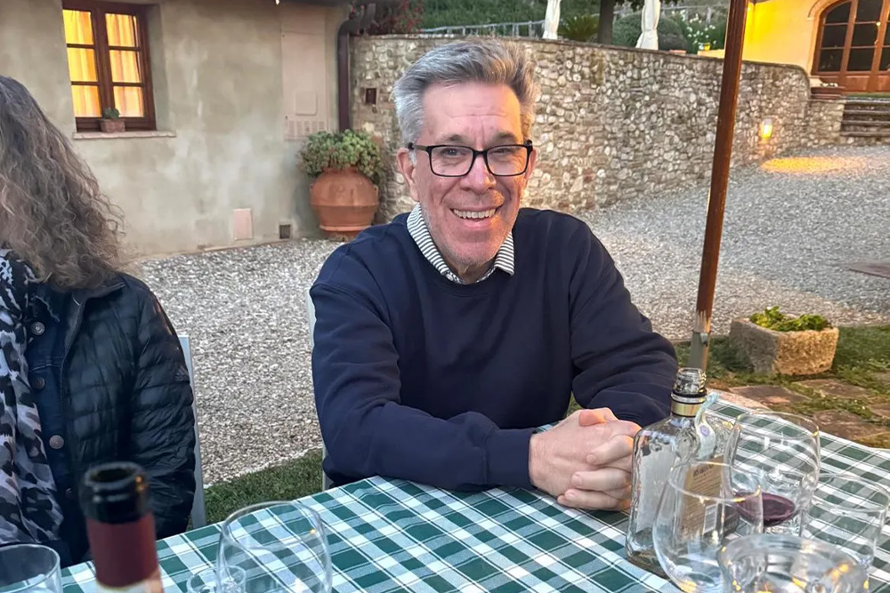 a man enjoys the workshop in Tuscany diligently