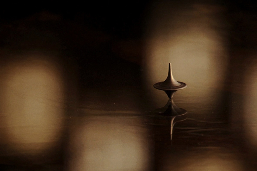 Spinning top from the film inception conceptualizes too many hats as a screenwriter