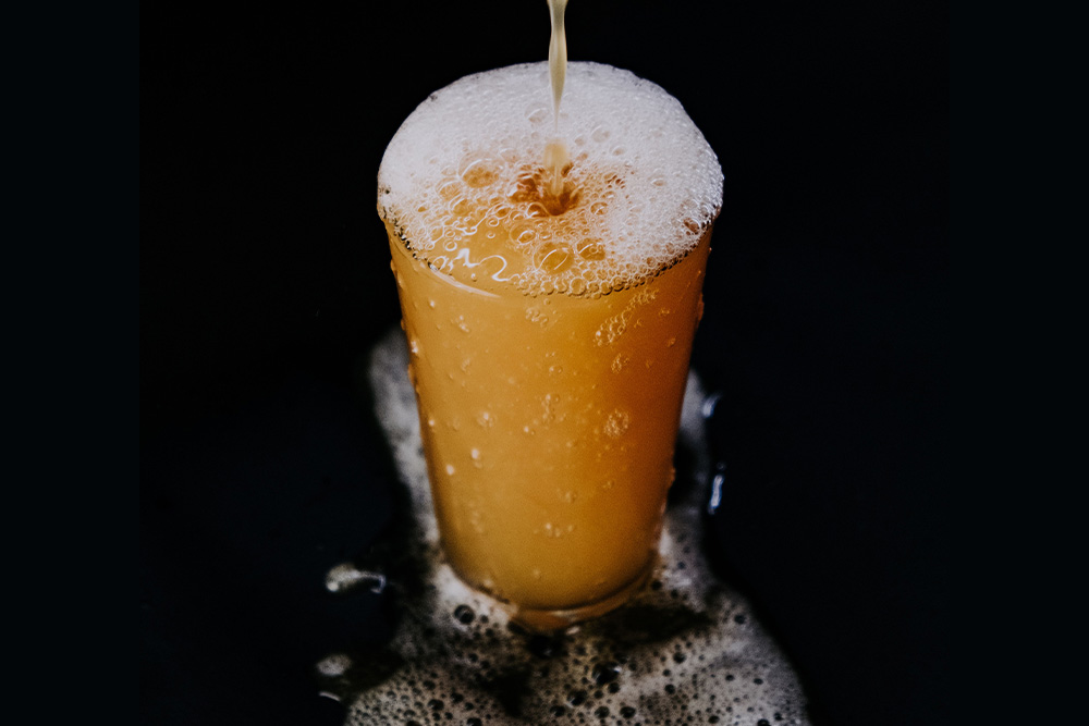An overflowing glass of beer suggests that one may get carried away with using a cumulative sentence, phallic themes evoke a sense of masculine overkill