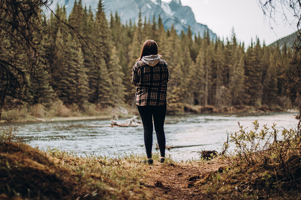A woman before the mountains hearing the call of the wild suggested as an example of what the hero archetype might be