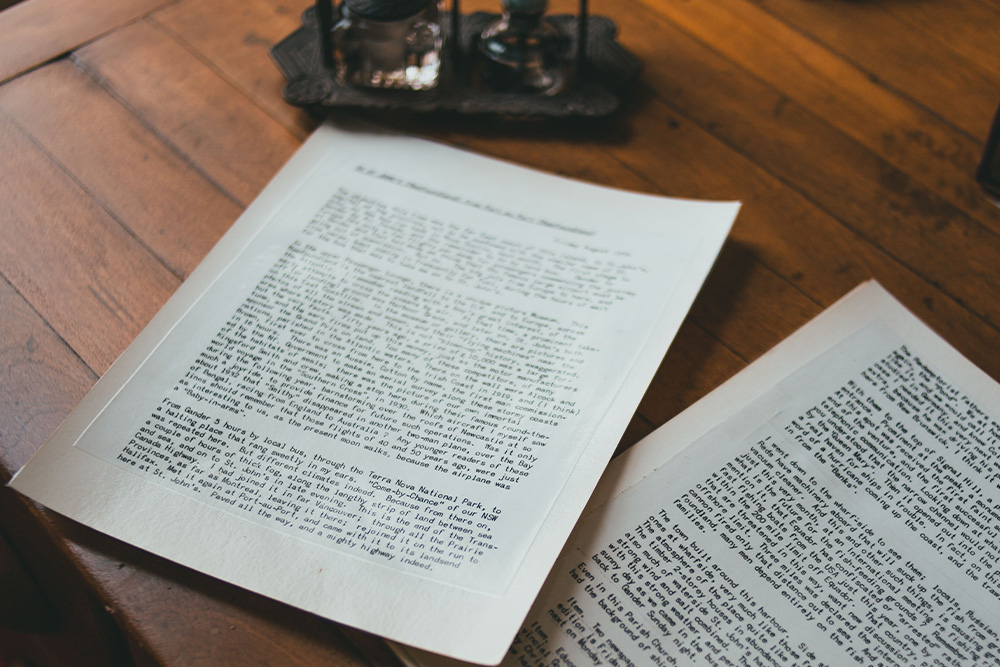 A script on a desk to suggest how differences between abridged vs. unabridged works connect back to the written page