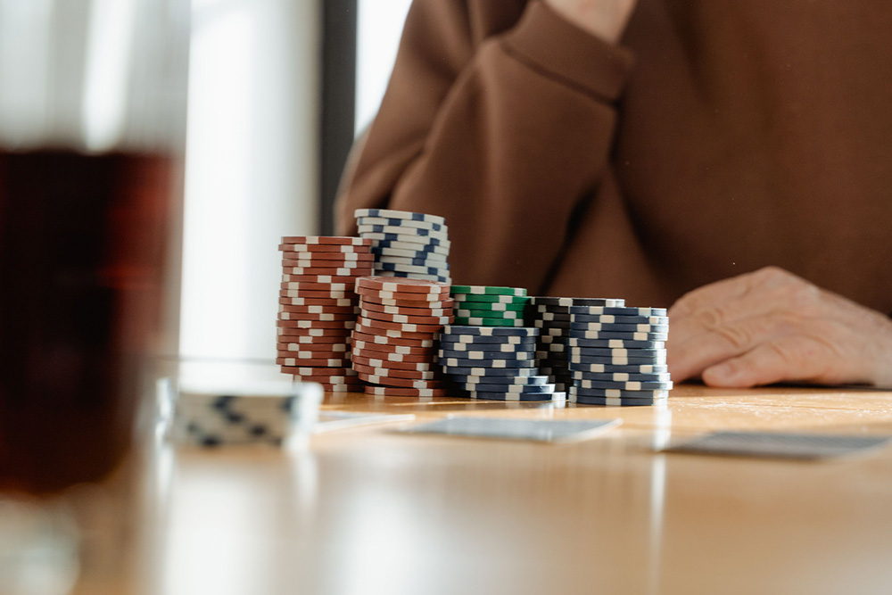 Someone with gambling chips sat out in front of them suggests that a writer should be careful with their money in amazon marketing services 