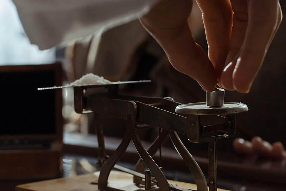 Salt is weighed against a gram measure to suggest visually how strengths and weaknesses are measured and scaled in a list of strengths