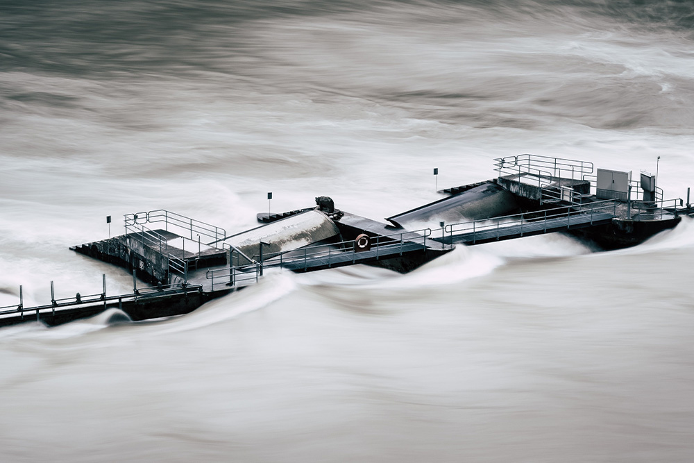 A dam overflowing suggests that there might be too much evil in the villain to make any sense of the story when the main character is the villain 