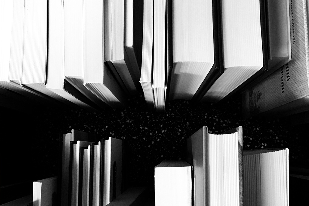 Books faced away from their spine suggest a validity of books without ISBNs to ask the author If they need to know how to get an isbn for their book