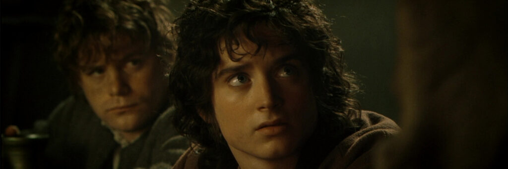 Image of Frodo in the foreground and Samwise Gamgee in the background as a visual cue to the importance of these types of characters in holding up the protagonist