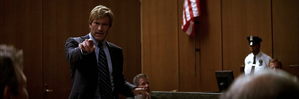 Harvey Dent in a courtroom to suggest how the character represents symbolically what these types of characters should effectively achieve in a story
