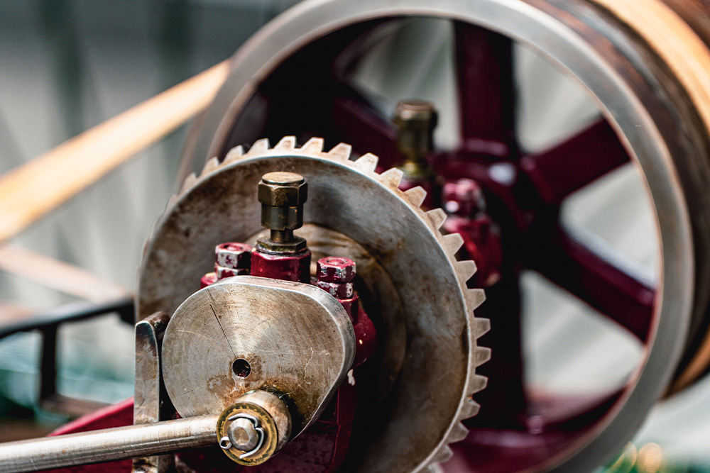 Three gears set in motion aside one another for elements of fiction working together