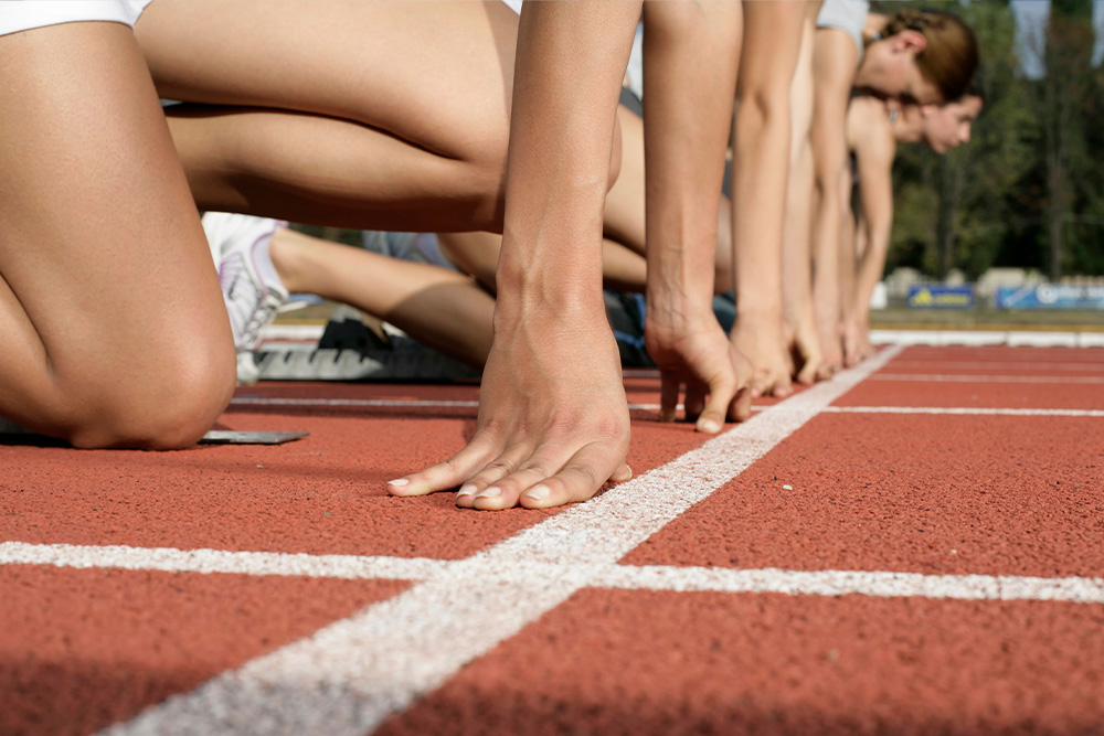 A group of racers at a starting line as a parallel for title analysis, a competitive start to the book proposal process 