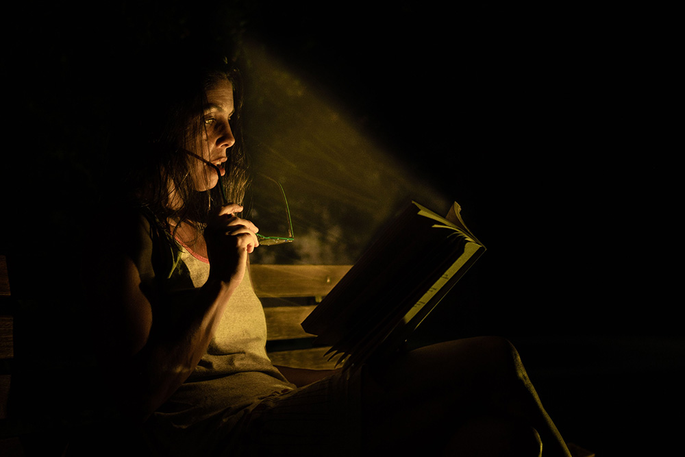 A book shining a light on a subject suggests that reverse outlining will lead you back to the light of your story