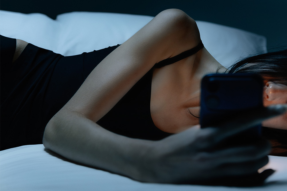 A woman in bed late at night suggests a seeker archetype may have a dark side too