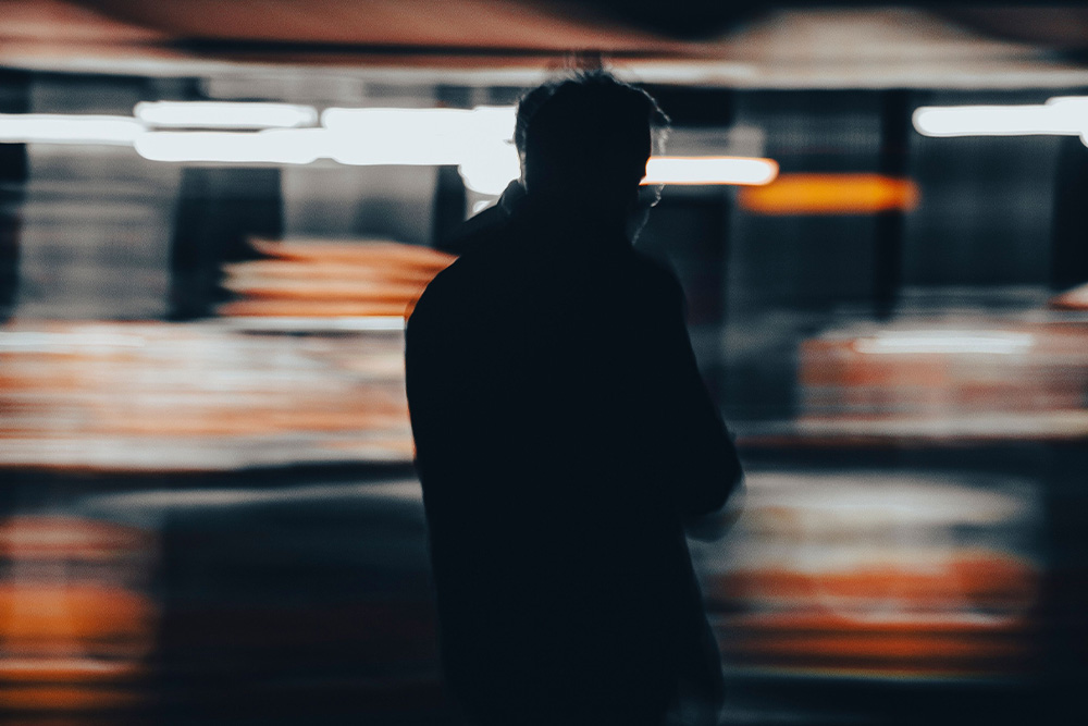 A character in a fast-moving frame to suggest that syntax varies to shape tension and pace