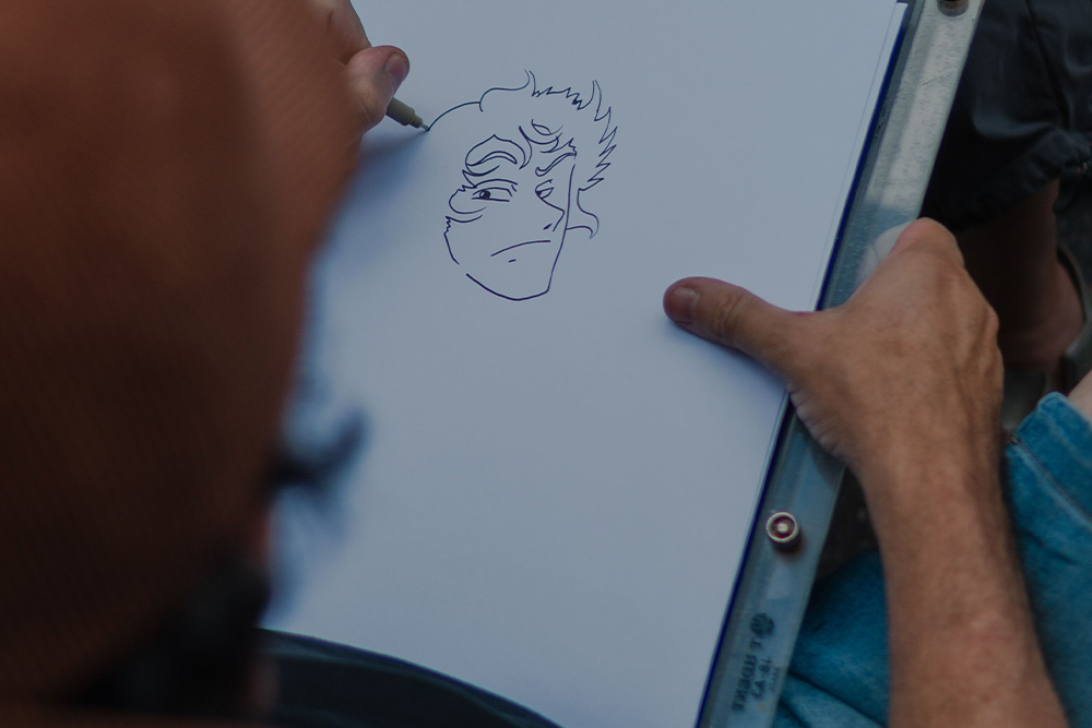 A character being sketched for a character bio template 