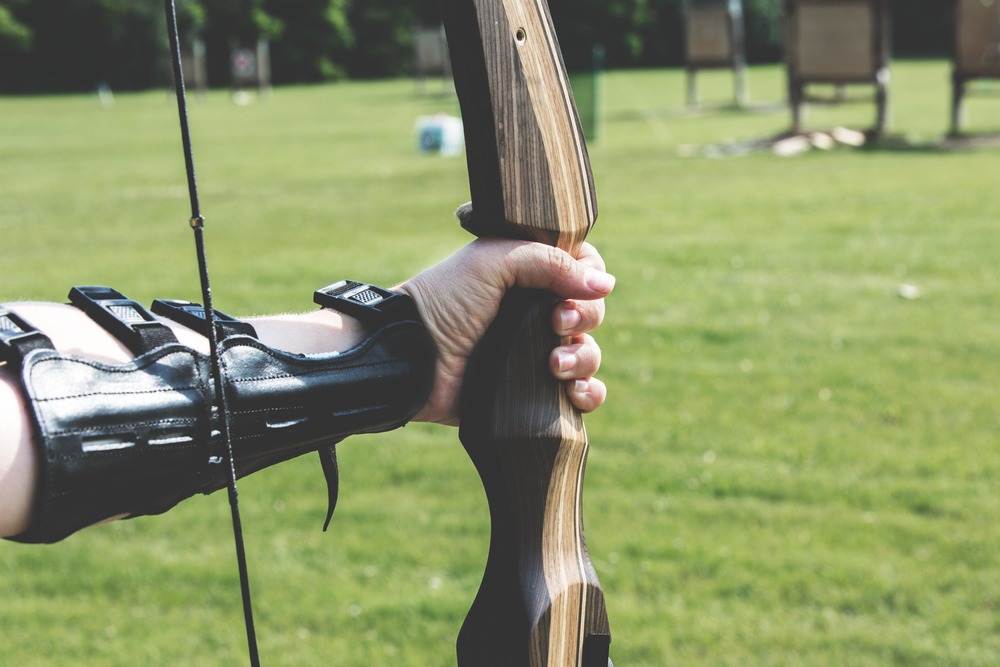 An archer representing the Hunger Games as an example of how to introduce a character.