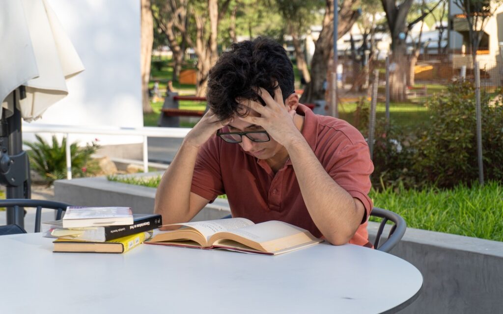 A stressed-out reader showing us the effects of effective tension in writing.