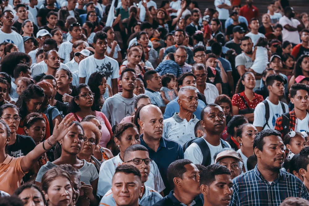 A crowd of people who might share a collective consciousness in the fourth person point of view in literature.