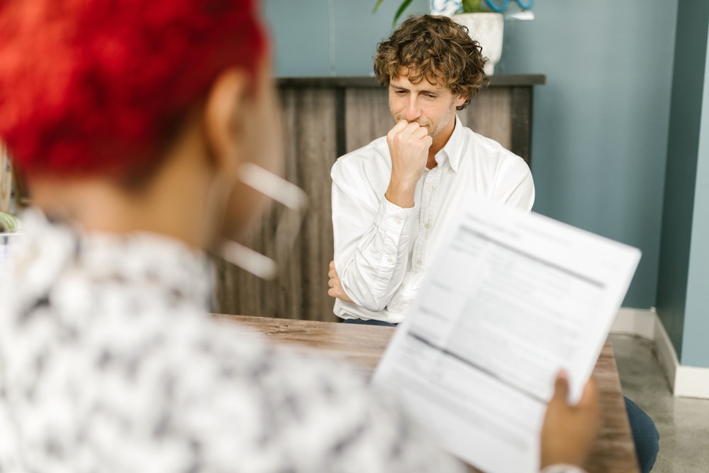 Job interviews can be stressful, especially for our character here demonstrating a type of tension in writing.